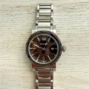 Swarovski Silver Watch with Amethyst Dial